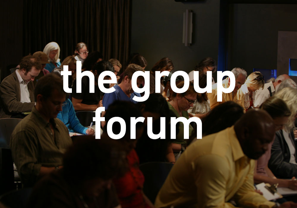 the group forum - a collection of writers attending a workshop with Alan Watt, taking notes